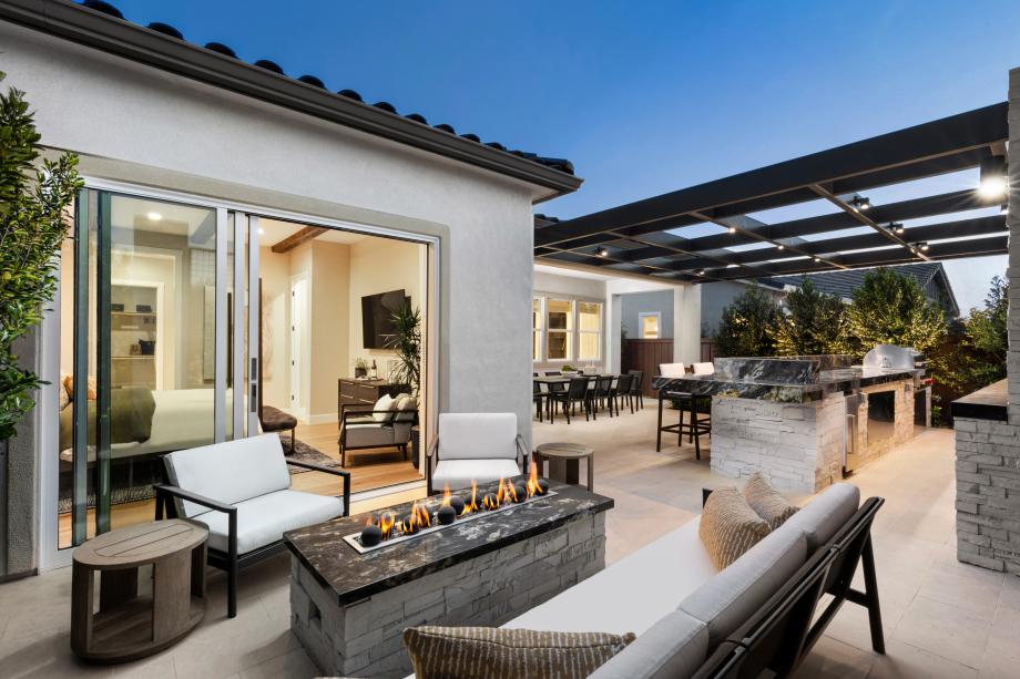 Generous outdoor living spaces with covered patios