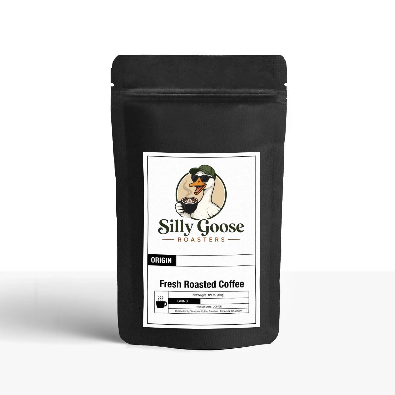 A black stand-up pouch with a white label featuring the 'Silly Goose Roasters' logo is shown against a white background. The logo depicts a cartoon duck wearing sunglasses and a baseball cap, holding a coffee cup. Below the logo, the label indicates 'Fresh Roasted Coffee', 'Net Weight: 12 OZ. (340g)', 'GRIND', and 'INGREDIENTS: COFFEE', along with distribution information.