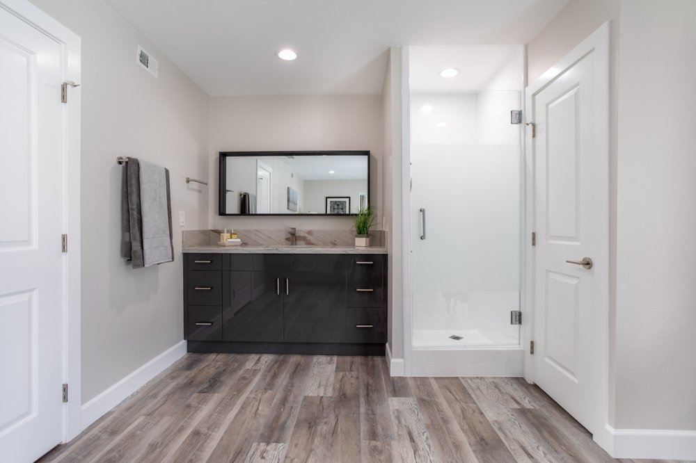 Valdez Mirrors Shower Door Logo