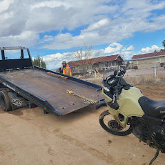 Stuck on the side of the road? Call for a tow!