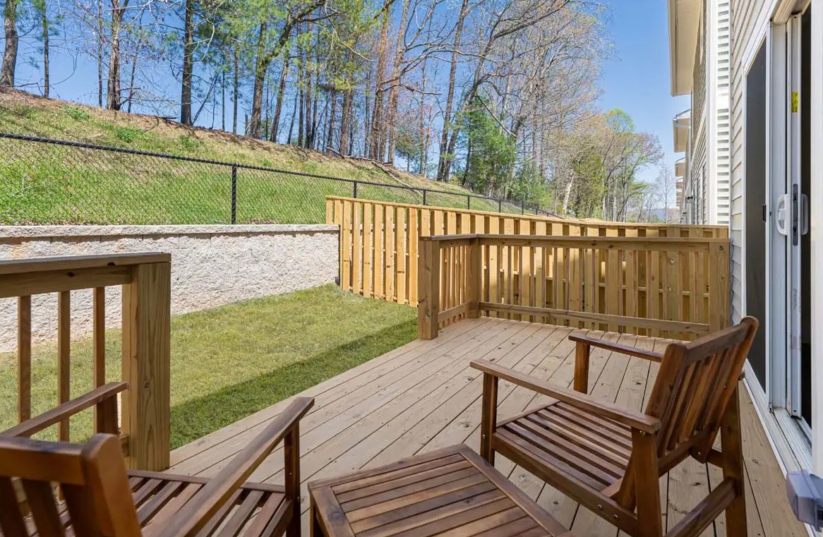 The fenced porch at Belle Meadow Homes offers a private outdoor space for relaxing or entertaining.