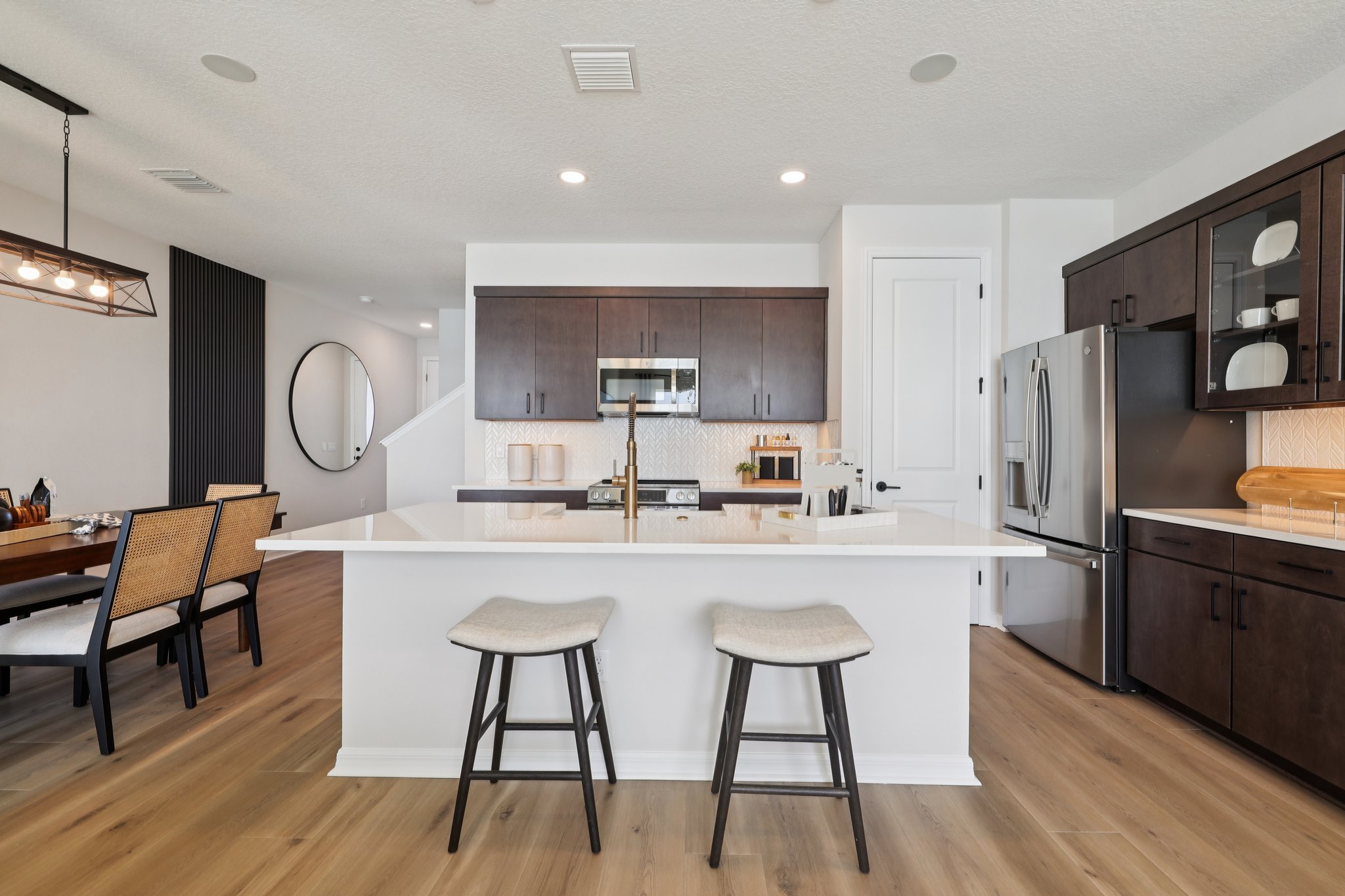 The Kitchen of a DRB Homes Aruba Home Plan at Isla Mirada in San Antonio, FL. 