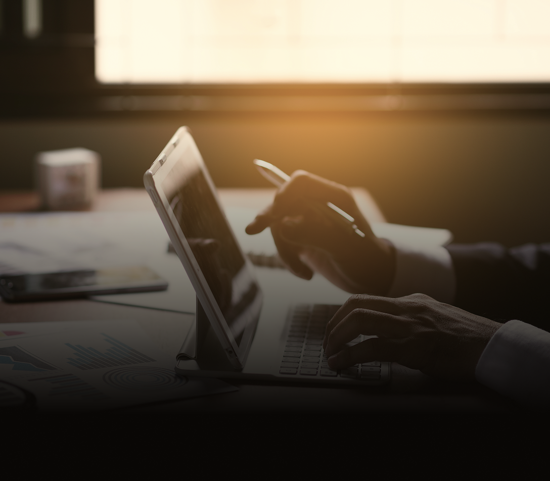 Close-up of a professional working on their tablet.