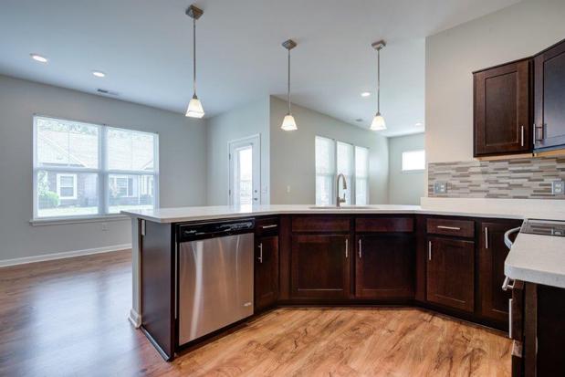 Images The Marquis at the Woods Apartments & Townhomes