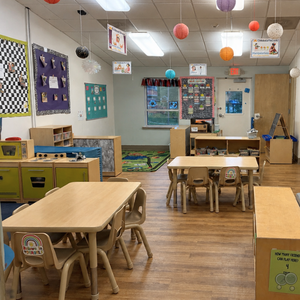 Bright and colorful preschool classroom at Childcare Network with age-appropriate learning materials