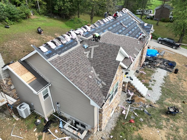 Images Nail'Em Down Roofing