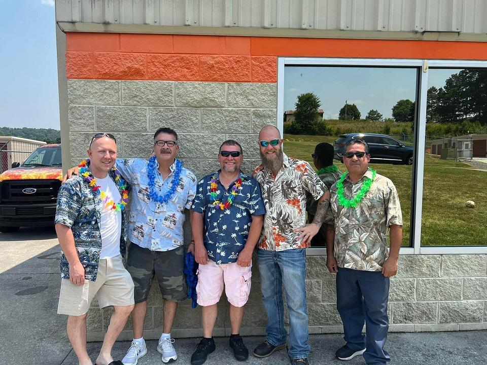 SERVPRO techs posing outside of office at picnic