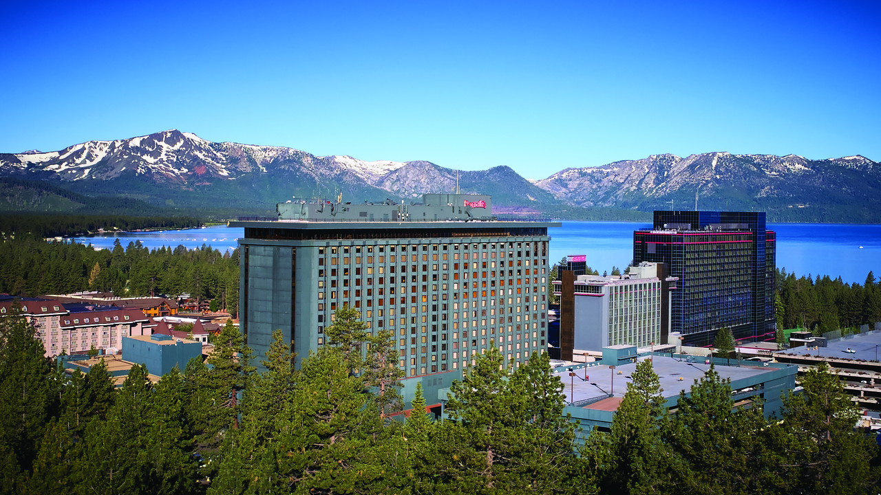 Harrah's Lake Tahoe exterior. At Harrah's Lake Tahoe you can relax in luxe hotel rooms with premier amenities, play the slots and tables at the casino, reserve a table at a world-class restaurant, and get in on the vibrant nightlife.