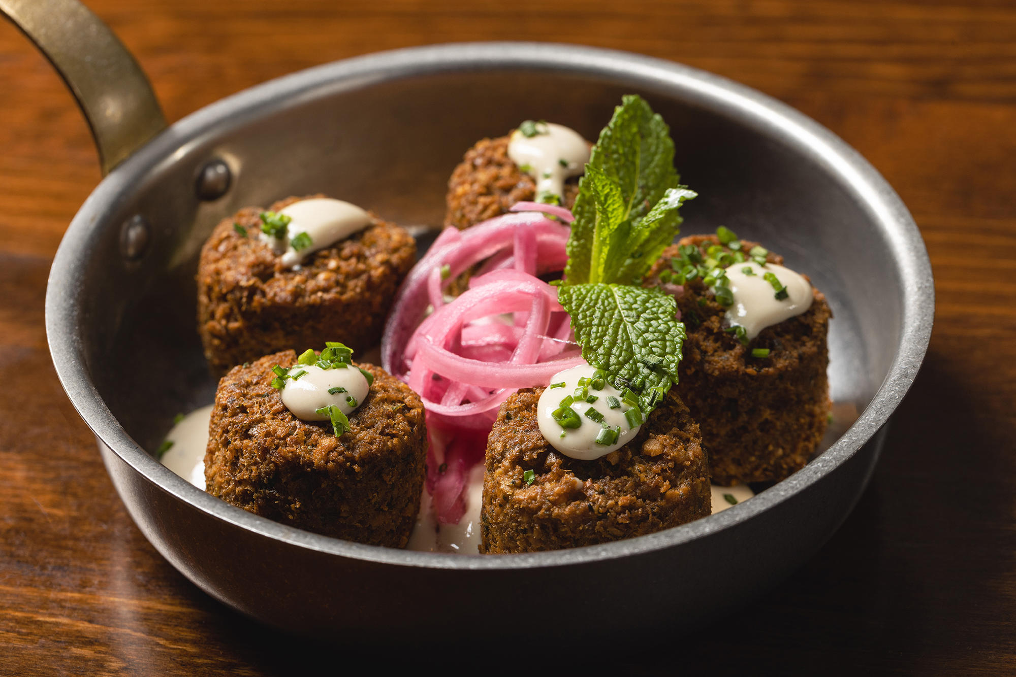 Share The Independent's Falafel Tots with the table in Midtown Manhattan