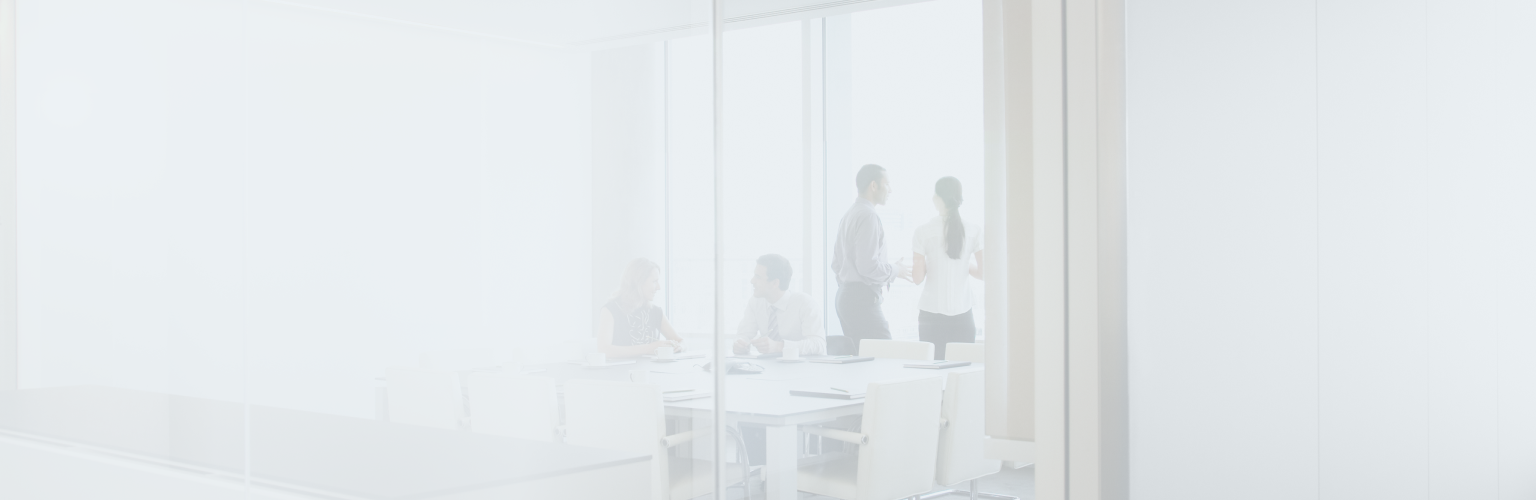 Wealth professionals collaborating in an office setting.