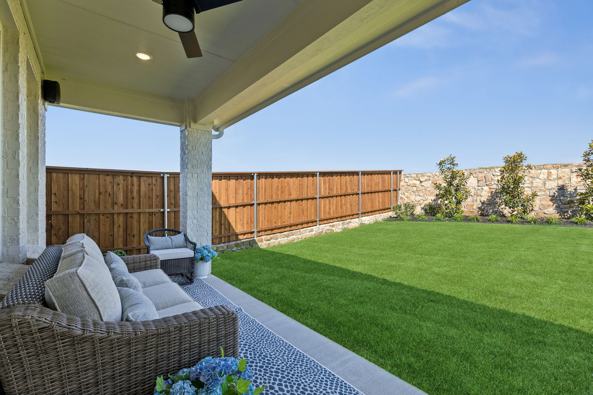 Backyard of the Rainwater Crossing model home in Celina, TX.