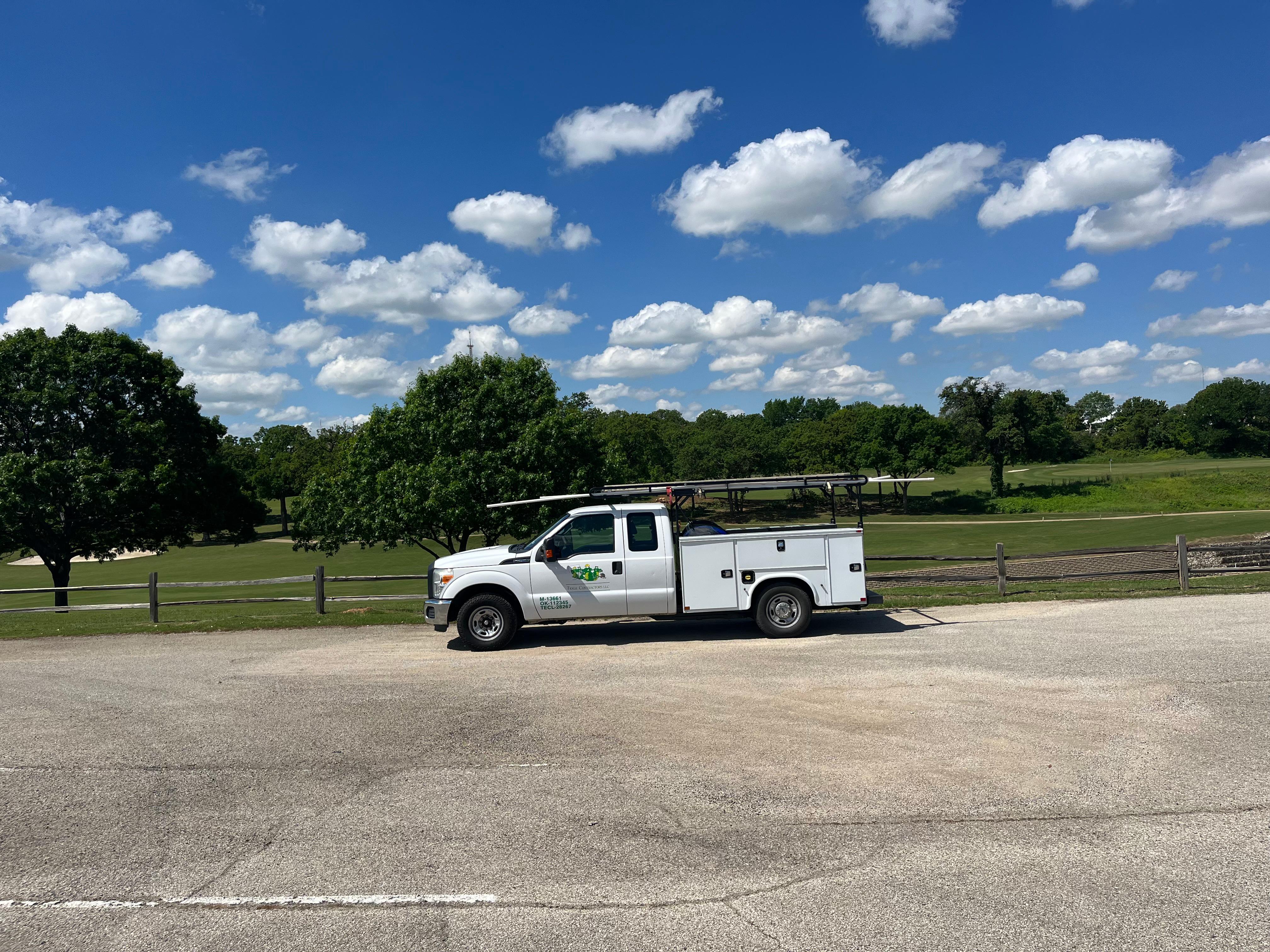 One of the Tioga Plumbing & Electric service trucks at a golf course near Euless Texas.