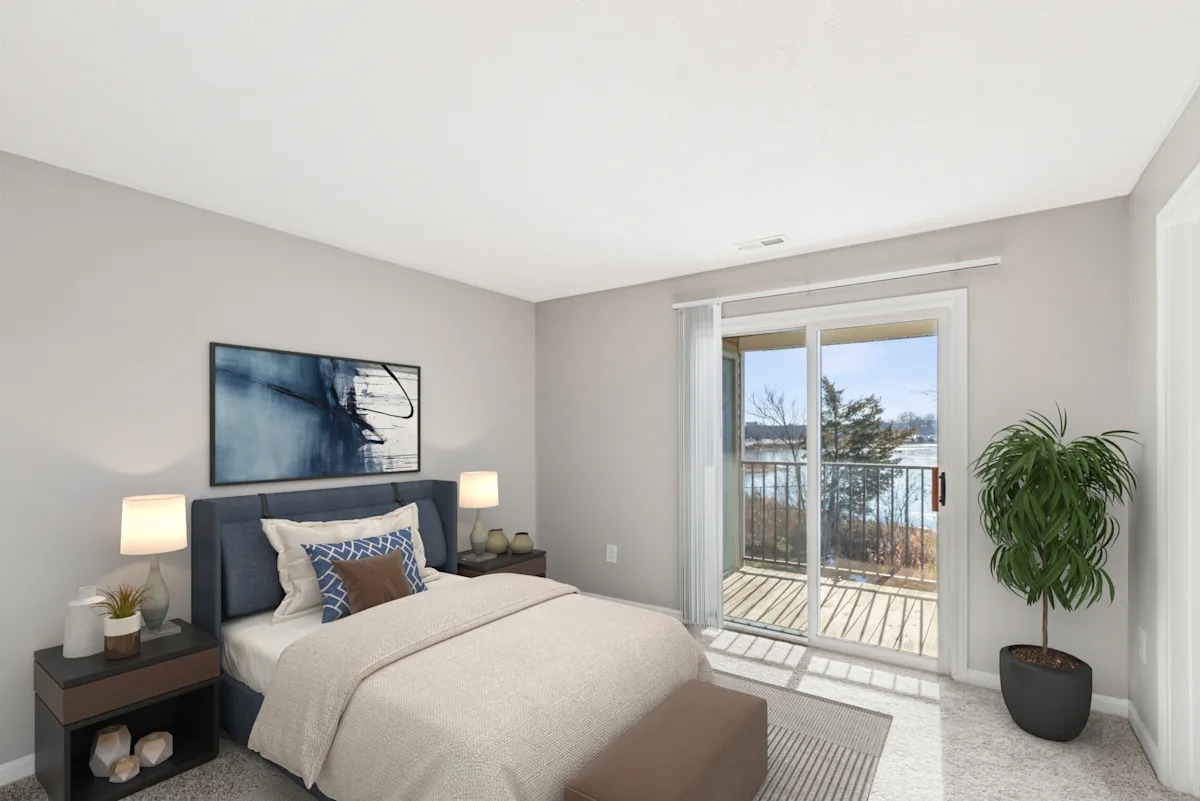 A bedroom with a view of the outside