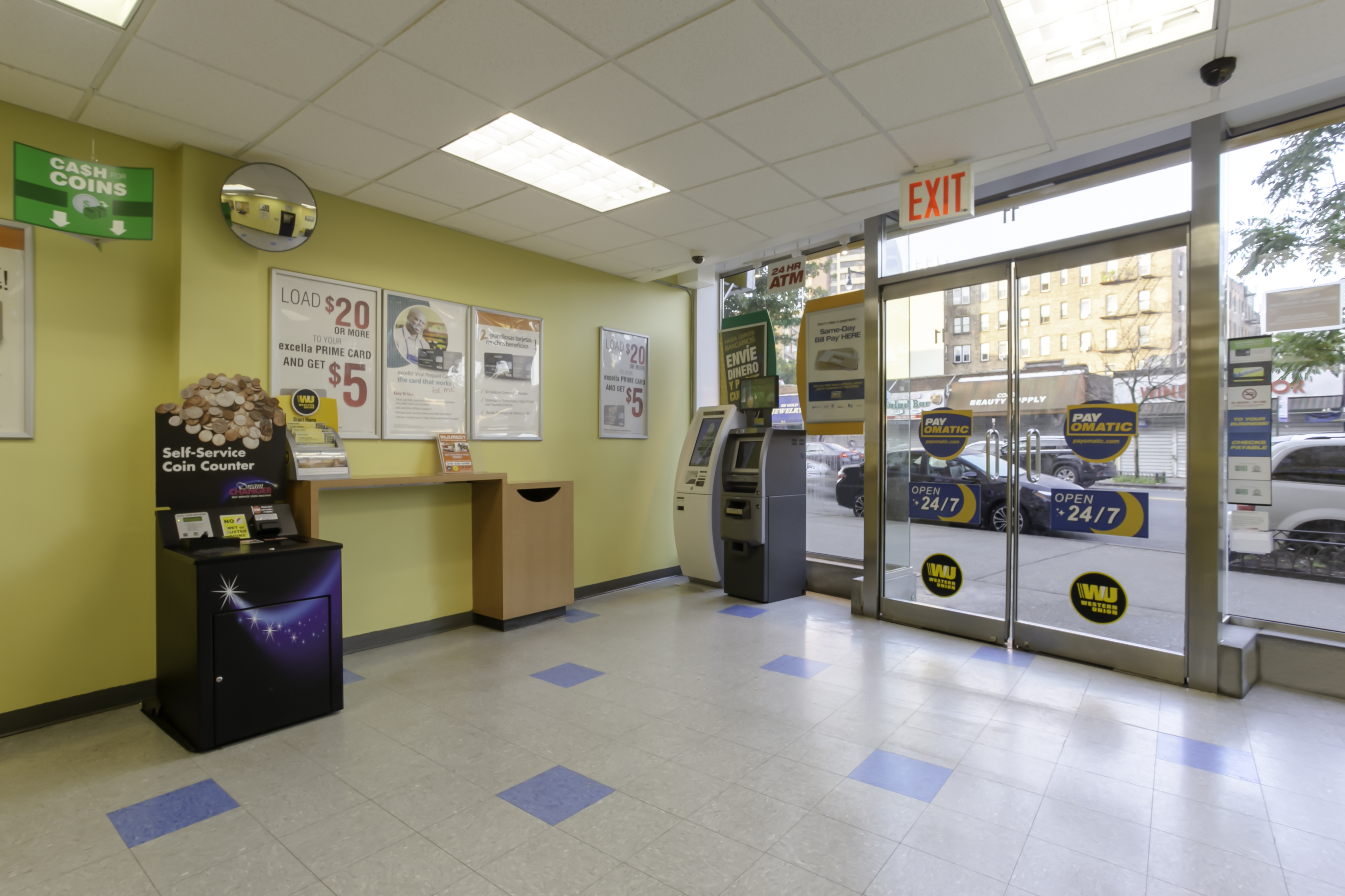 Customer waiting area and entrance inside PAYOMATIC store located at 11 East Gunhill Road Bronx, NY 10467