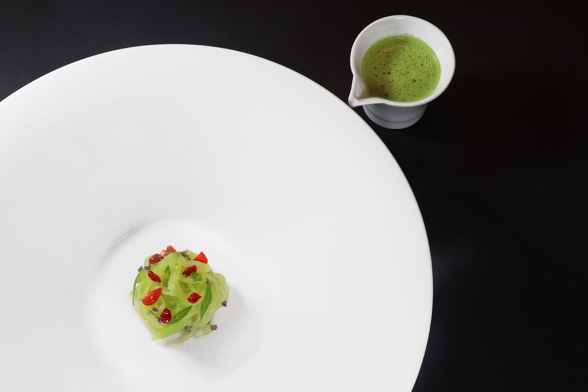 Celtuce, cooked a la flamme, with cucumber and buddha's hand. A vegetable driven course on the Discovery Menu. Vegetarian tasting menus can be prepared with advance notice.