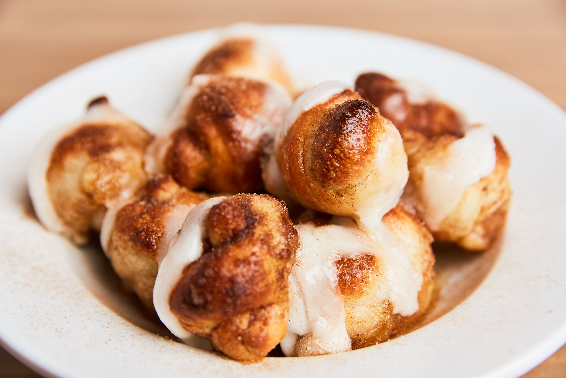 CINNAMON KNOTS (WITH ICING) - Our homemade dough knots with butter and sprinkled sugar and cinnamon. Johnny's New York Style Pizza Snellville (770)978-8180