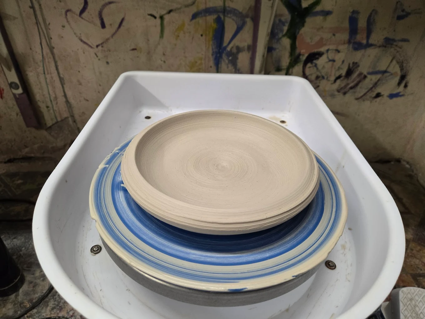 Midwood Framing & Arts Center offers wheel throwing pottery classes in Brooklyn for beginners and experienced artists who want to build real skills. Learn how to shape clay on the pottery wheel with guidance from skilled instructors in a relaxed, hands-on studio setting. Sign up today to start creating your own handmade pottery.