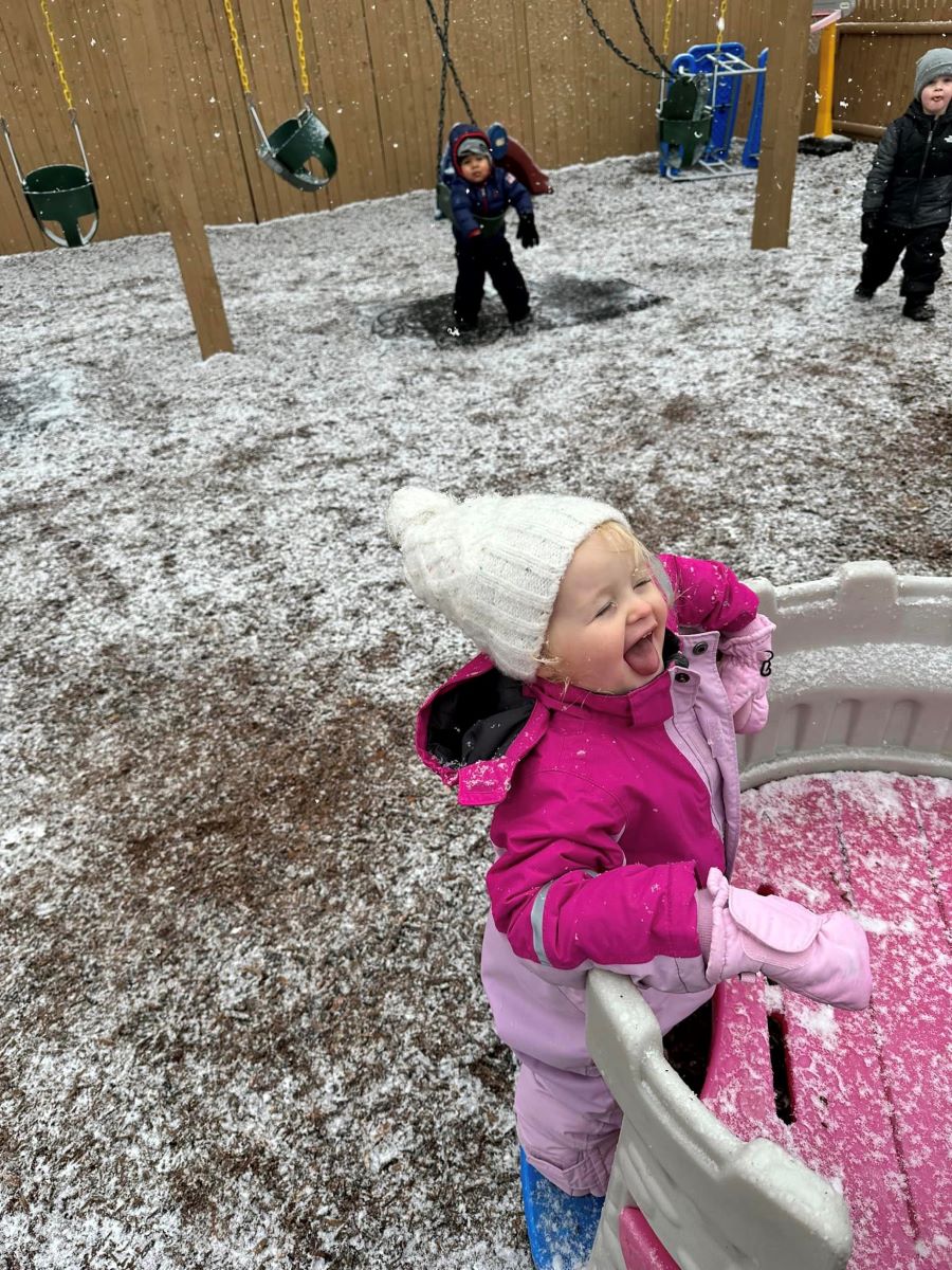 Outdoor fun in the snow at Little Footsteps Childcare.