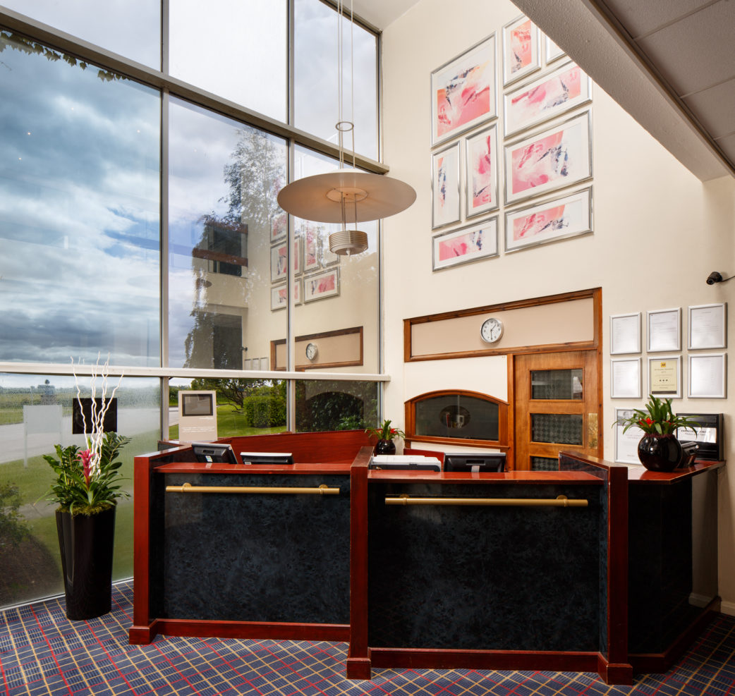 Reception desk at Mercure Wetherby Hotel, floor to ceiling windows. Mercure Wetherby Hotel Wetherby 01937 862918