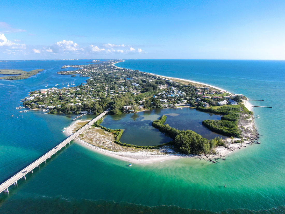 Aerial view of Anna Maria Island town and beaches, a barrier island on Florida's Gulf Coast in Manatee County.