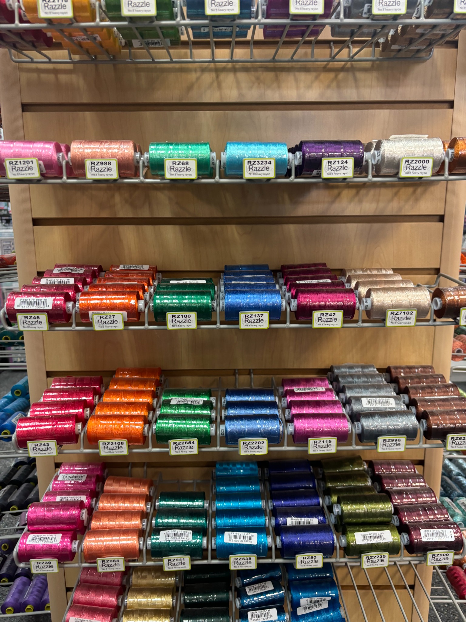 Discover a vibrant selection of Razzle decorative embroidery threads at Decorative Stitch. Choose from a wide range of shimmering colors perfect for embroidery, quilting, decorative stitching, and creative sewing.