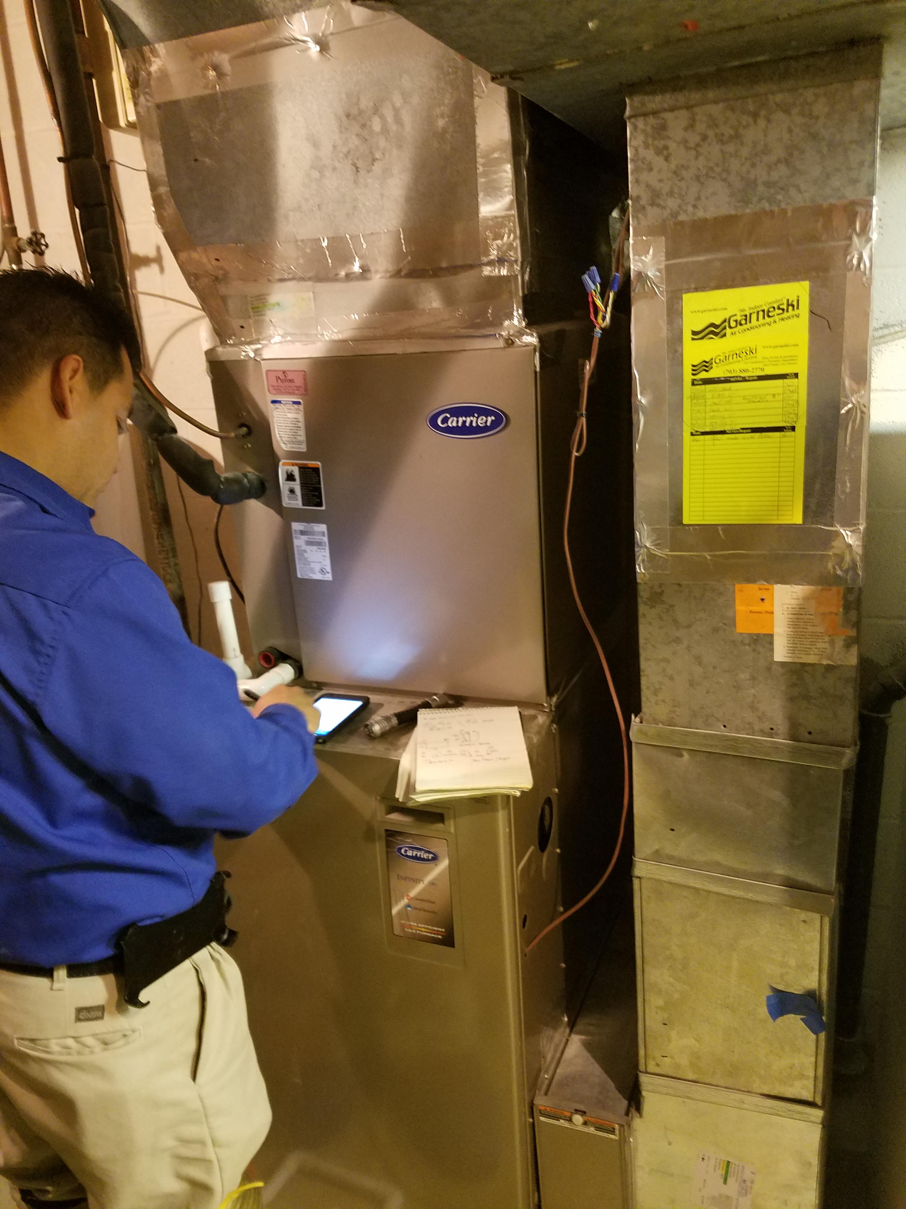 Garneski-Air-Conditioning-and-Heating-service-technician-at-work Garneski Air Conditioning & Heating Co Sterling (703)880-2770