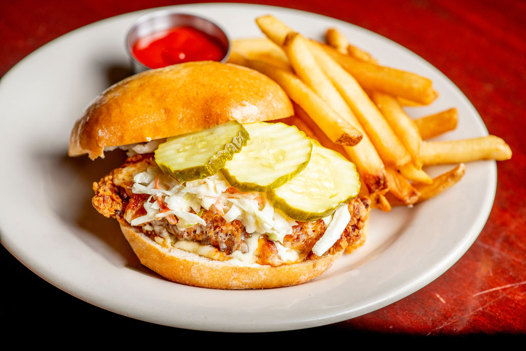 Nashville Hot Chicken Sandwich: fried chicken breast, pepper jack, coleslaw, pickles, ciabatta