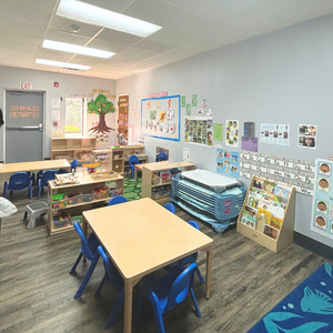 Bright and colorful preschool classroom at Childcare Network with age-appropriate learning materials