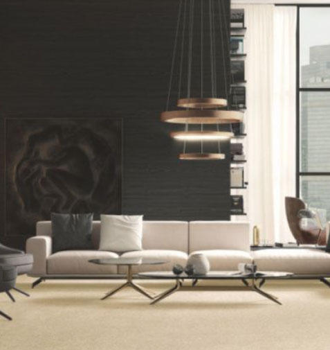 A living room featuring a velvet carpet