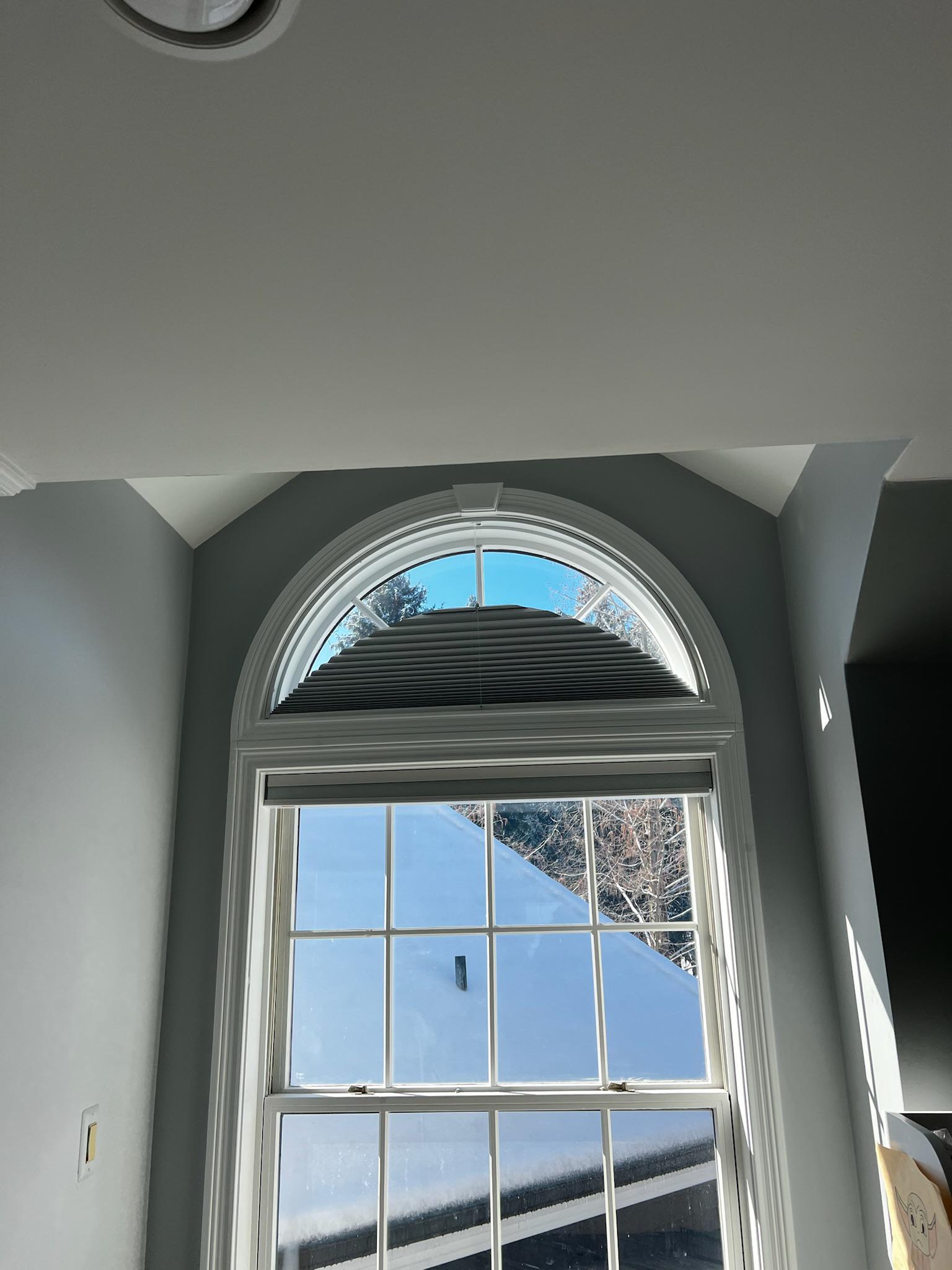 Cellular shades are a fantastic way to cover your arched window. They are beautiful and functional.