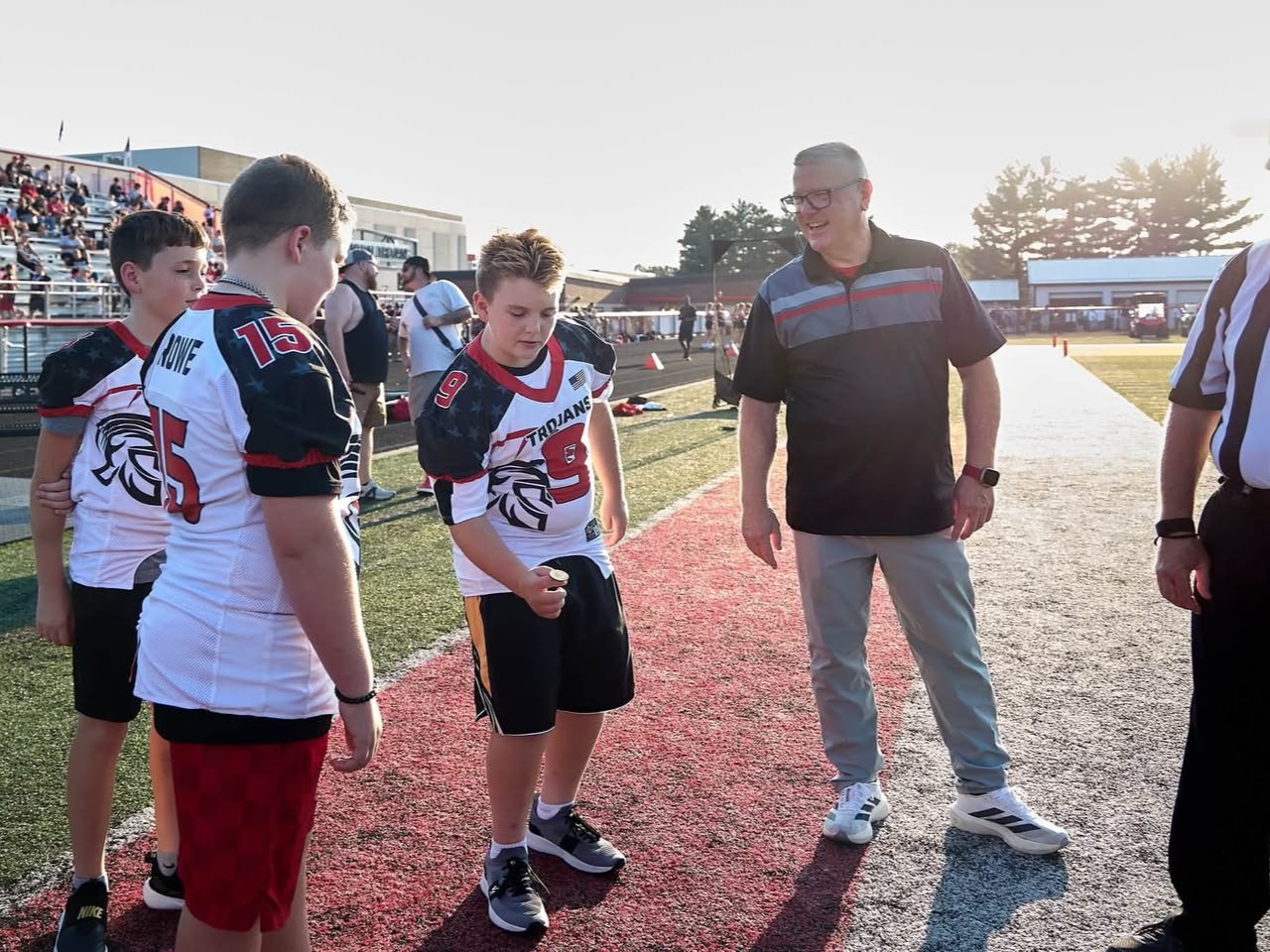 Each year, I sponsor the game ball for East Central High School home football games and get to share the experience with three Pee Wee players. Seeing their excitement makes it even more memorable. Thank you, Sandy Mahoney, for the photos!