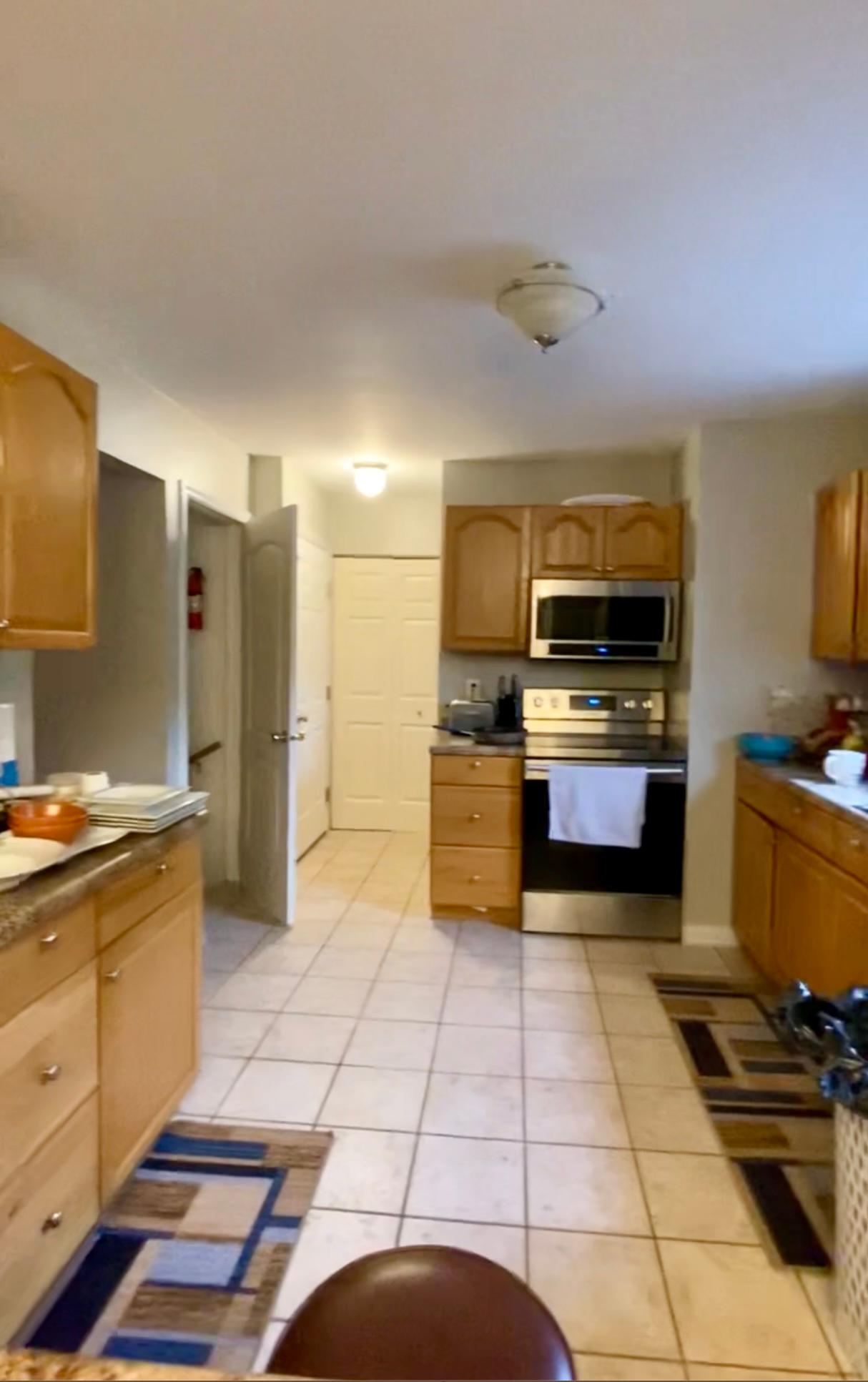 V &amp; T Landscaping and General Services LLC Logo