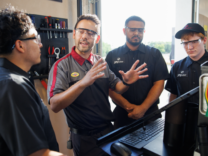 Jiffy Lube oil change team huddle