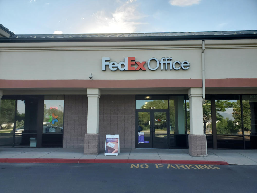 Exterior photo of FedEx Office location at 10287 S State St\t Print quickly and easily in the self-service area at the FedEx Office location 10287 S State St from email, USB, or the cloud\t FedEx Office Print & Go near 10287 S State St\t Shipping boxes and packing services available at FedEx Office 10287 S State St\t Get banners, signs, posters and prints at FedEx Office 10287 S State St\t Full service printing and packing at FedEx Office 10287 S State St\t Drop off FedEx packages near 10287 S State St\t FedEx shipping near 10287 S State St