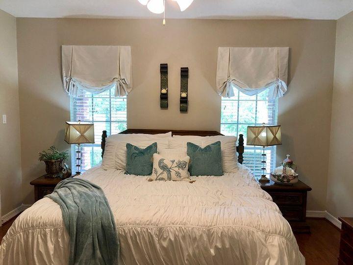 Do you want to remodel the style of your Richmond, TX home? If so, Mock European Roman Shades over Wood Blinds create an awe-inspiring design that’s breathtaking. Try it out! #BudgetBlindsKatySugarLand #MockRomanShades #WoodBlinds #BlindedByBeauty #ShadesOfBeauty #FreeConsultation #WindowWednesday