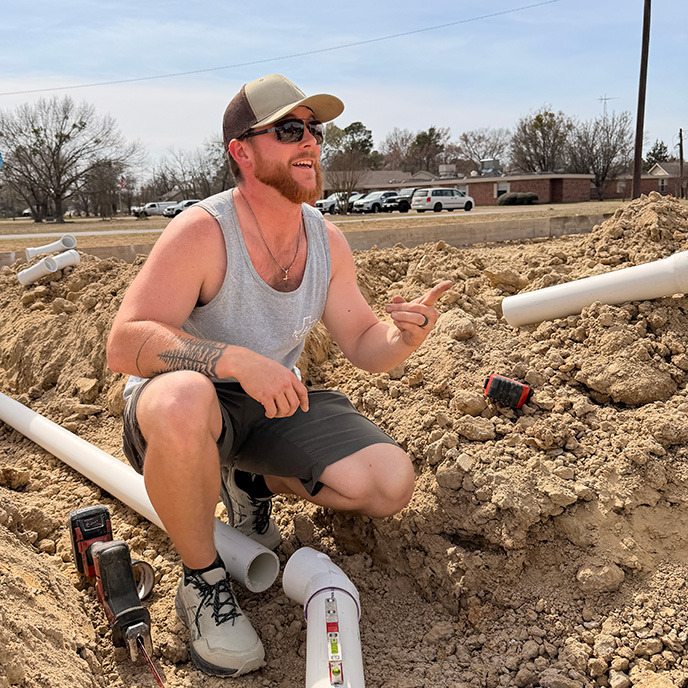 A&J Plumbing and Construction crew working in water line in emory texas 