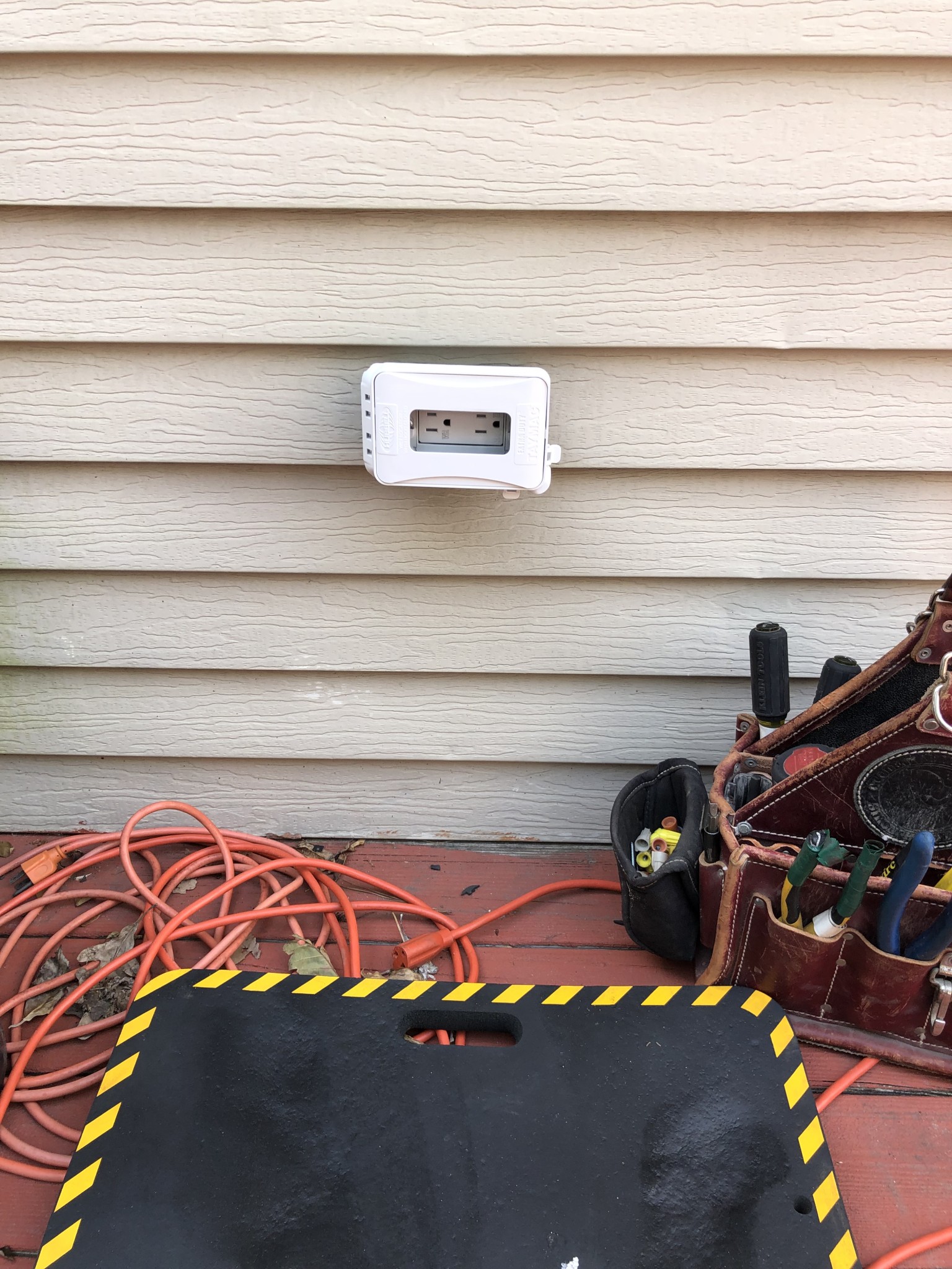 Removed existing nonfunctional electrical receptacle. Installed new exterior rated Leviton GFCI device and Tarmac Hubbell cover.