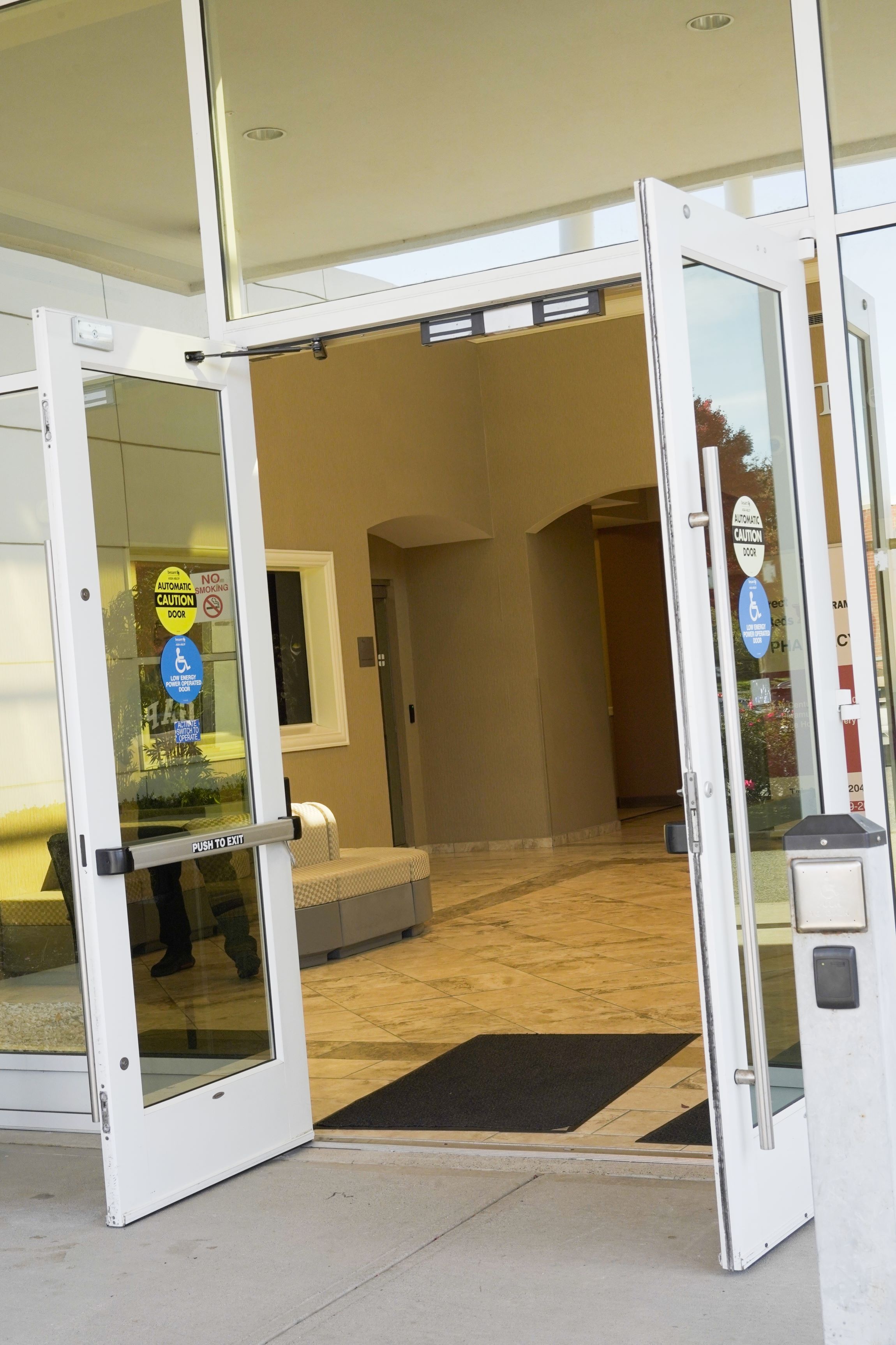 New Century Spine and Outpatient Surgical Institute's front door.