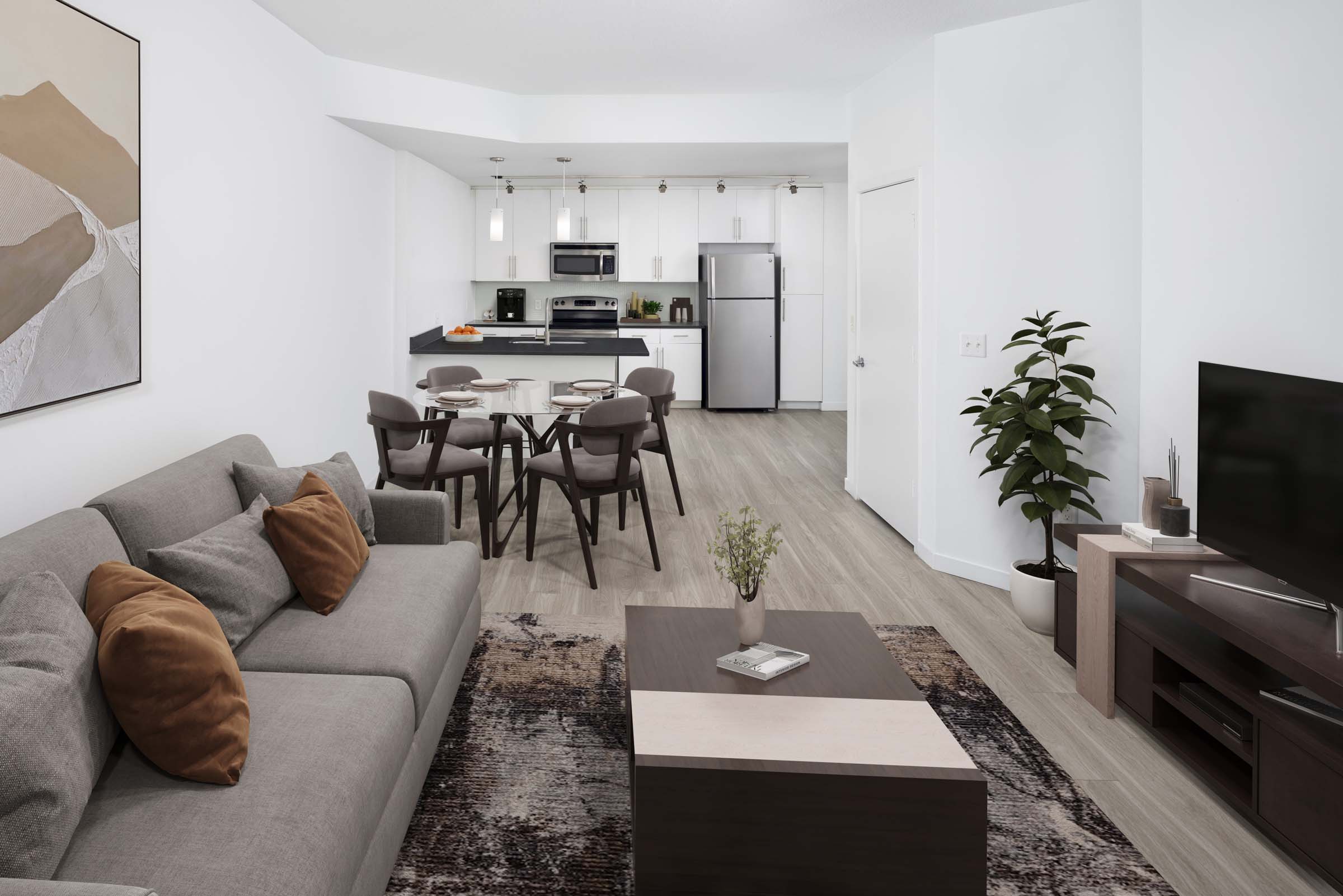 Living, dining and kitchen apartment home at Camden Thornton Park in Orlando, FL.