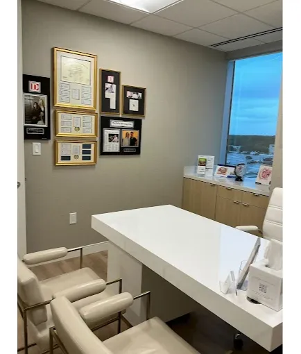 Private consultation room for Women’s Wellness Institute of Dallas and cosmetic gynecology services, designed for comfortable, confidential patient care and personalized treatment discussions.