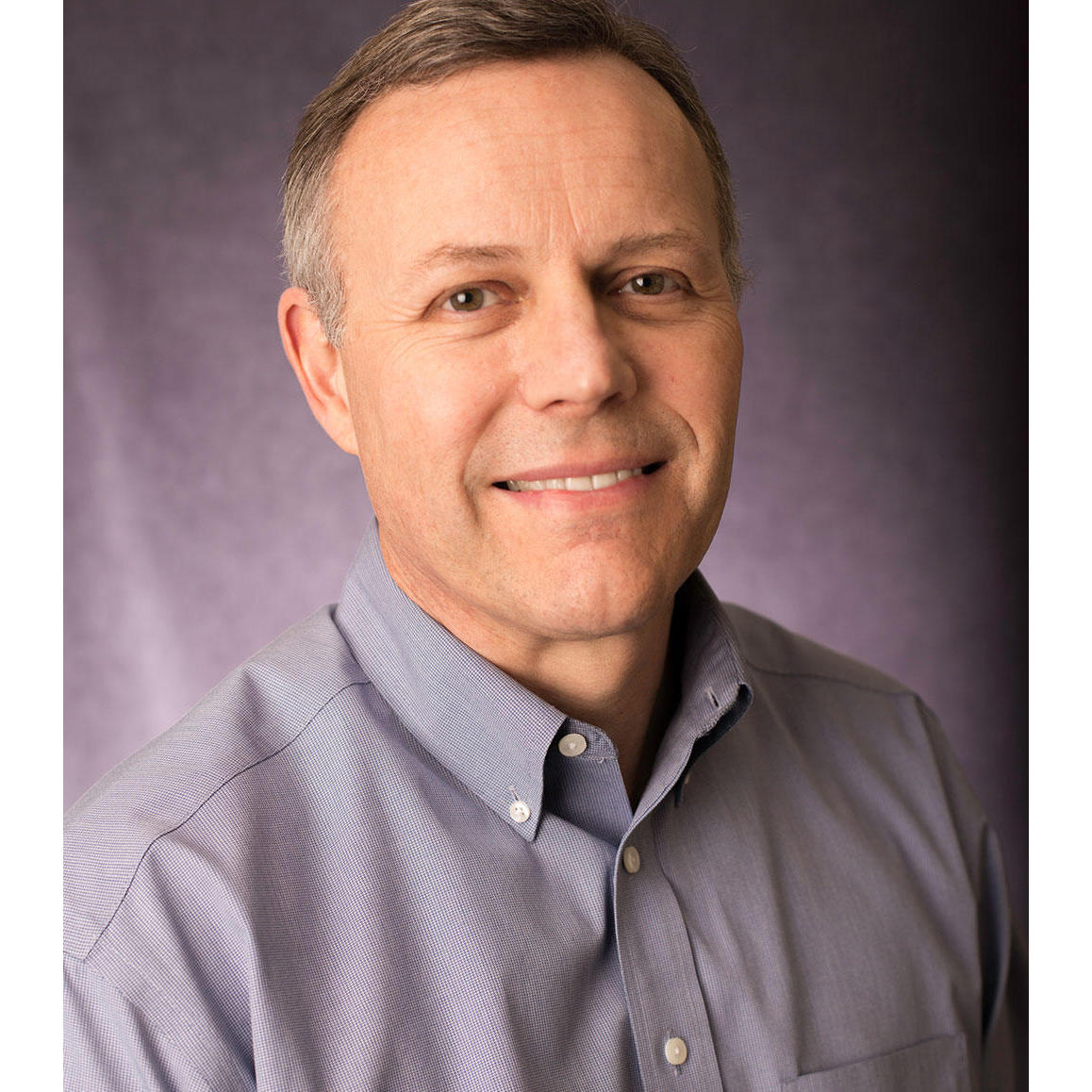 Headshot of Dr. Clive G. Daniels