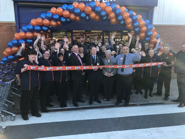 The store team at B&M's newest store in Newcastle-upon-Tyne pose in front of their wonderful new Home Store & Garden Centre, located on Brunton Lane.