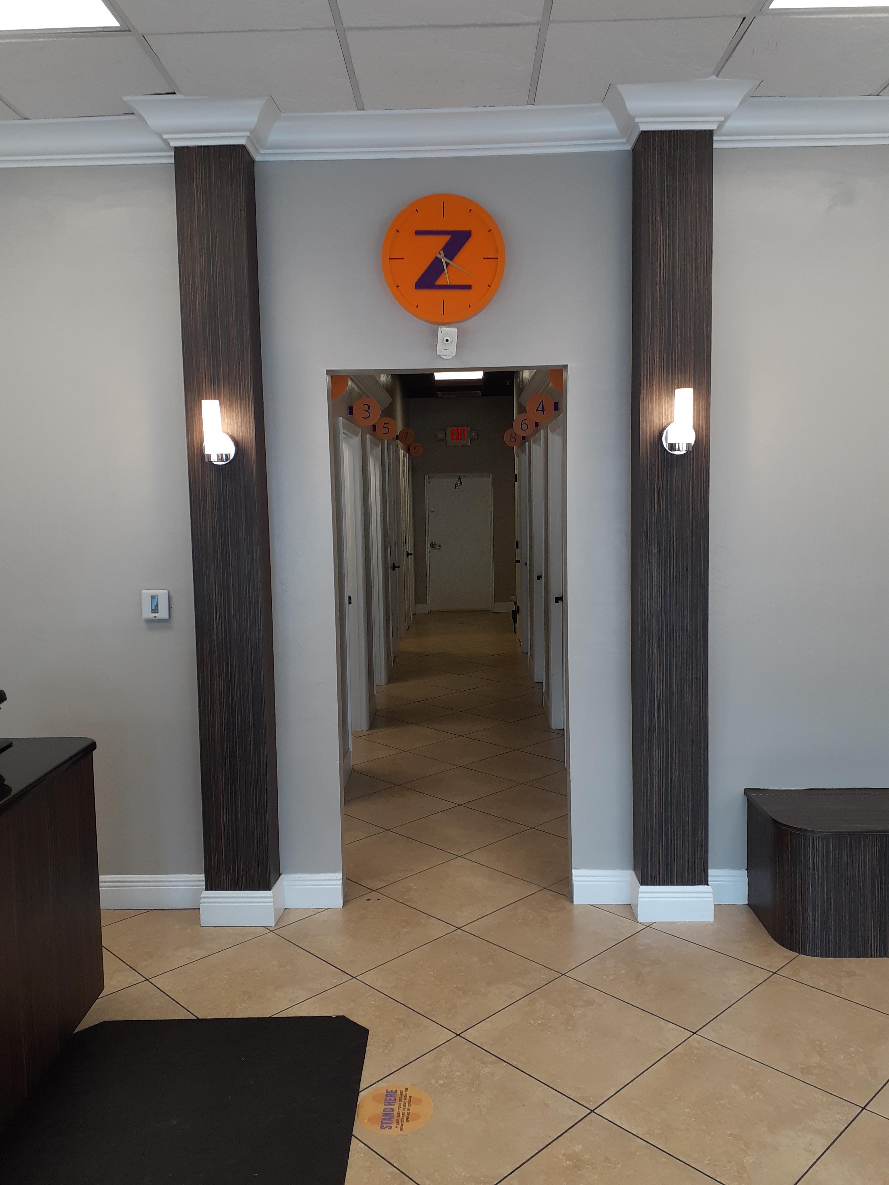 Zoom Tan hallway leading to tanning rooms in Tampa, FL