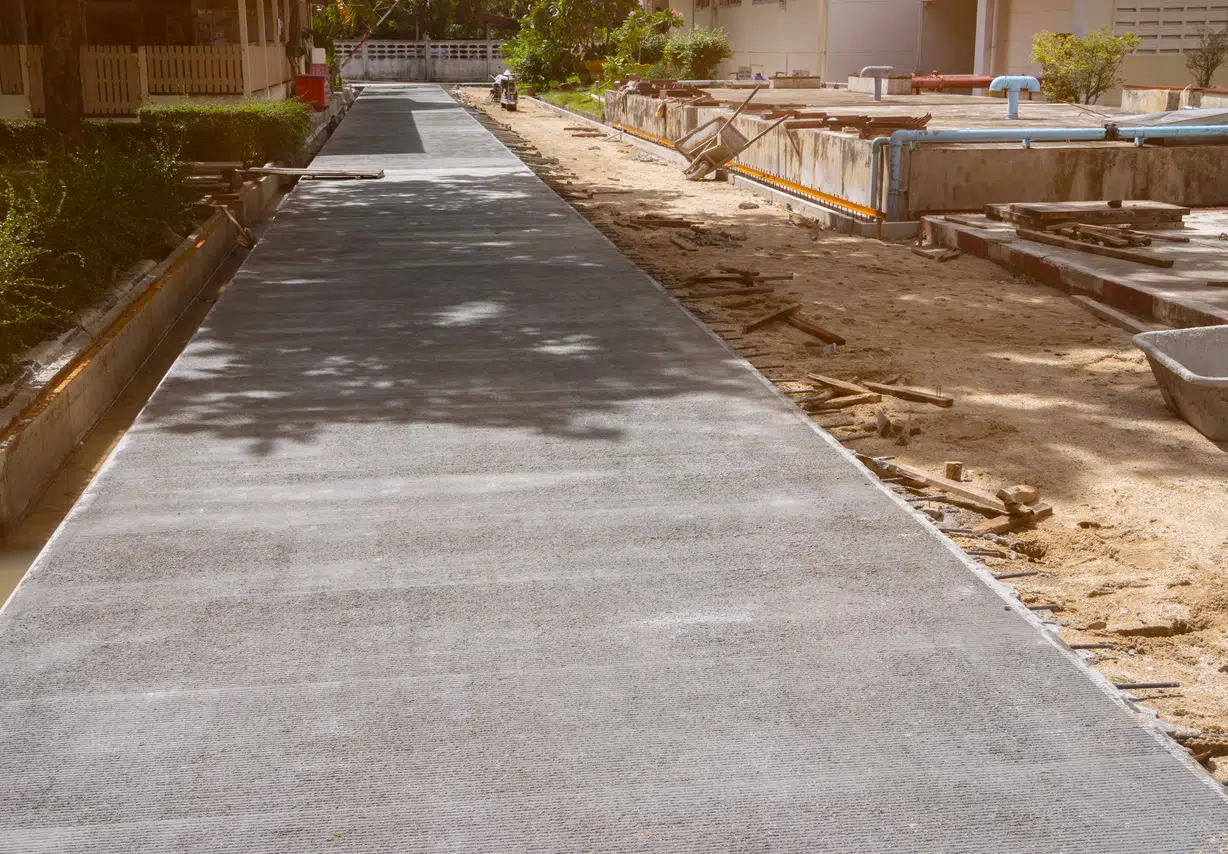Professional concrete paving services that create smooth, durable, and long-lasting walkways, sidewalks, and flatwork for commercial, municipal, and residential properties. Our experienced team uses premium concrete materials and proven installation methods to deliver structurally sound surfaces that improve accessibility, safety, and curb appeal. Every project is completed with precision, ensuring exceptional durability, proper drainage, and lasting performance in high-traffic environments.