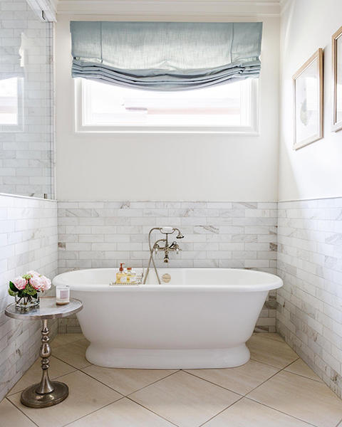 Add privacy to your master bath with a custom roman shade