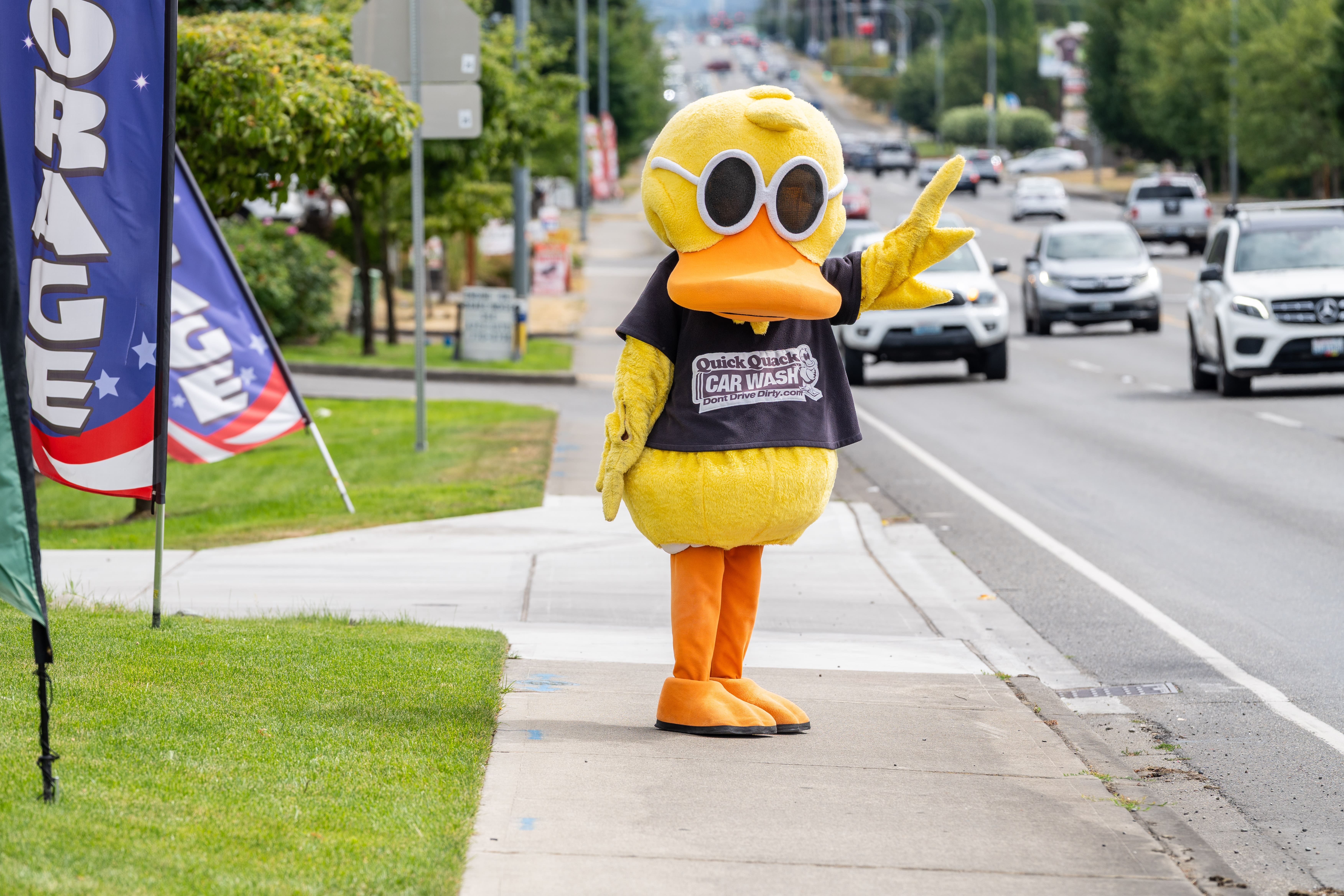 Keep an eye out for the Quick Quack duck! Our mascot brings energy and fun to every location while welcoming drivers to fast, clean, and unlimited car wash services nearby.