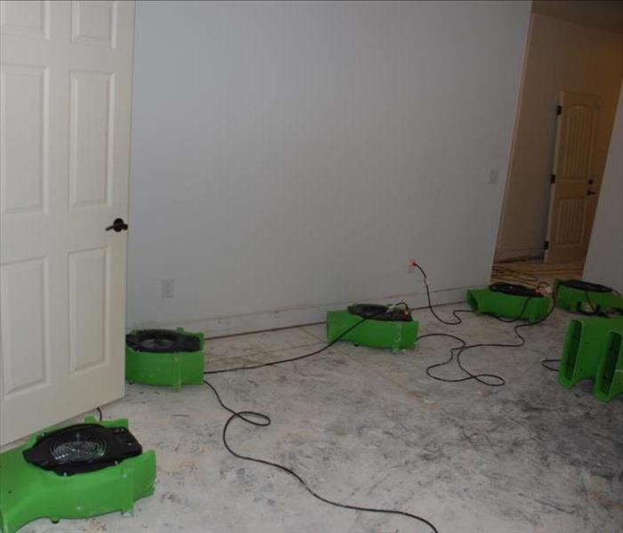 This Bell Canyon storm damage was the result of a flash flood then entered a section of the lower level. The carpeting was removed along with the baseboards since there was no chance of restoration. Our equipment salvaged the walls and the furnishings from further water damage.