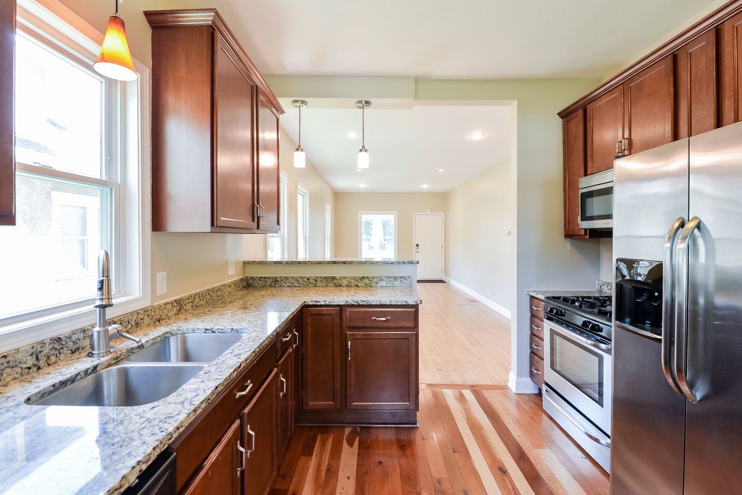 Beautiful kitchen with stainless steel appliances at Invitation Homes Minneapolis.