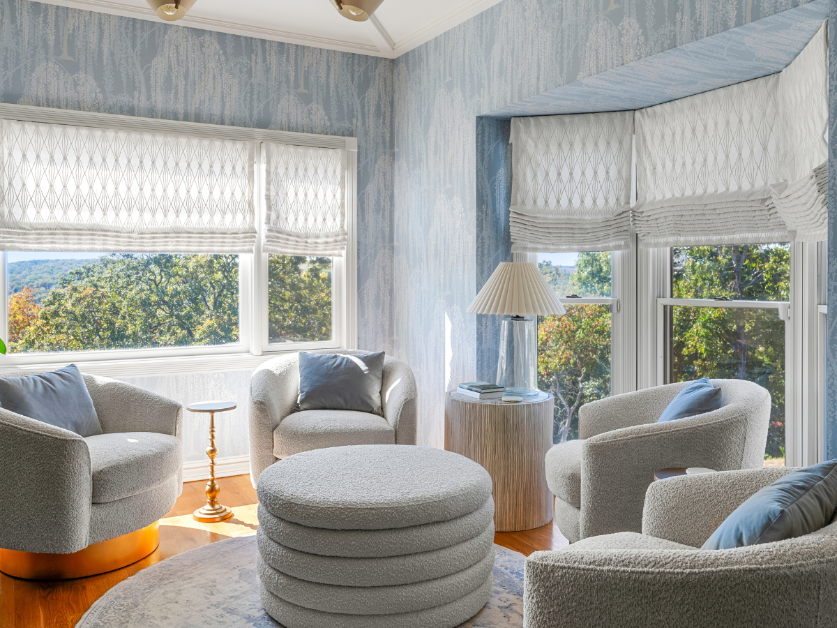 Flat Roman Shades in a sitting room.