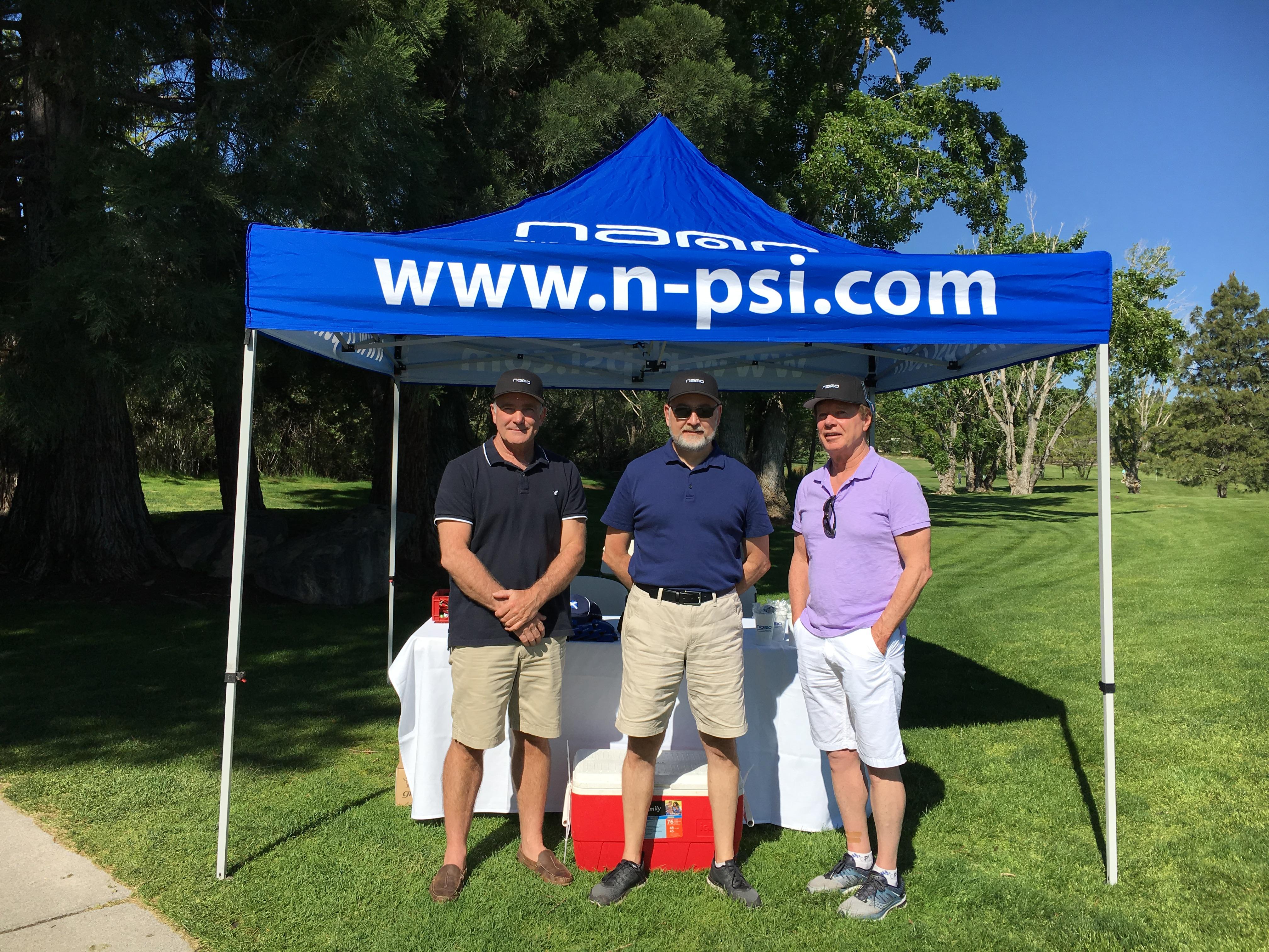 nano employees manning hole in one contest booth at a compressed air distributor association golf tournament